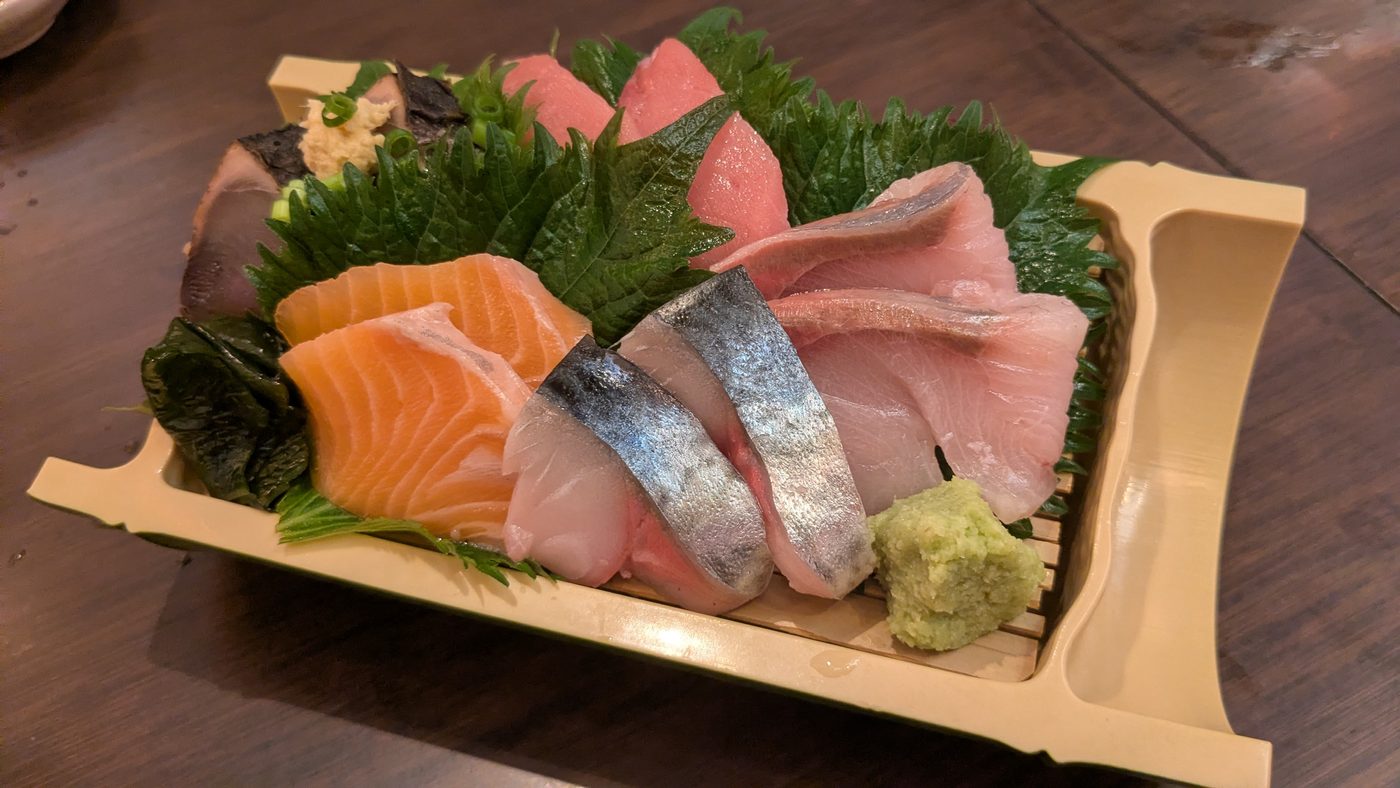 Assorted sashimi on a wooden platter