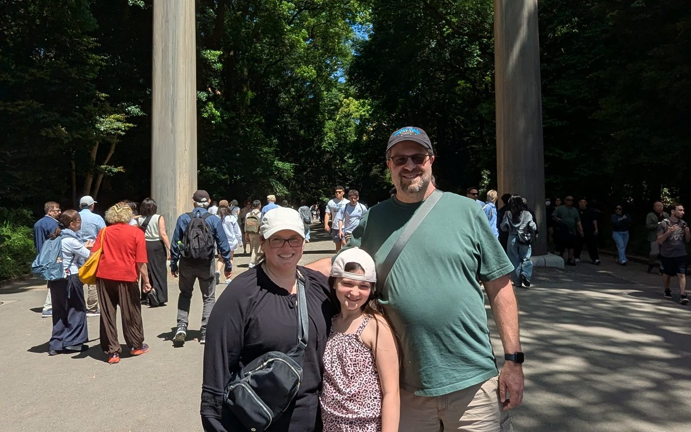 Guests at the great torii gate of Meiji Shrine